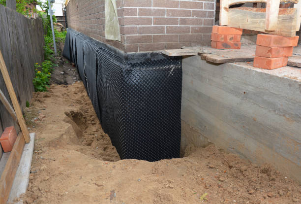 Happy homeowners after waterproofing job in Vincentown